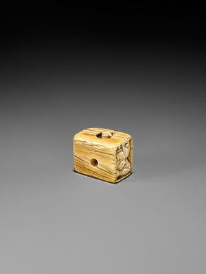 A RARE IVORY NETSUKE OF AN ONI HIDING IN A BOX DURING SETSUBUN