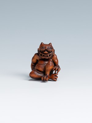 Lot 388 - MASAKAZU: A WOOD NETSUKE OF AN ONI SEATED ON A RAT
