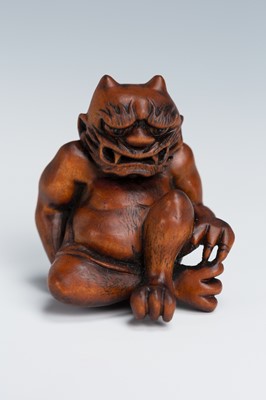 Lot 388 - MASAKAZU: A WOOD NETSUKE OF AN ONI SEATED ON A RAT