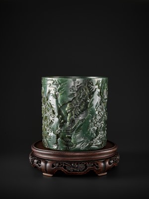 Lot 194 - A LARGE AND RETICULATED SPINACH JADE BRUSHPOT, BITONG, QIANLONG PERIOD