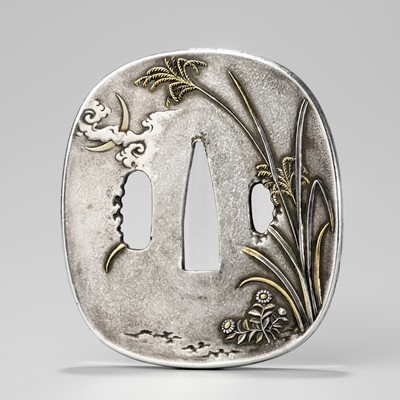 Lot 246 - SHUZUIKEN KIYOAKI: A FINE GOTO SCHOOL SILVER TSUBA WITH KIKU AND SUSUKI UNDER THE CRESCENT MOON