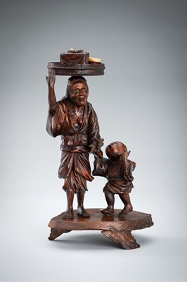 HOJITSU: A WOOD OKIMONO OF AN ELDERLY MAIDEN AND CHILD
