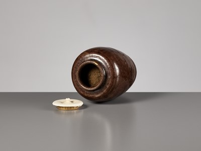 Lot 127 - A CHESTNUT BROWN-GLAZED POTTERY CHAIRE