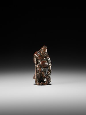 Lot 368 - A FINE CYPRESS WOOD (HINOKI) NETSUKE OF SHOKI AND ONI