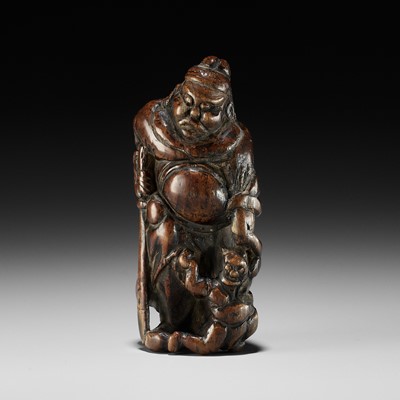 Lot 368 - A FINE CYPRESS WOOD (HINOKI) NETSUKE OF SHOKI AND ONI