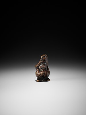 Lot 195 - MASATOMO: A WOOD NETSUKE OF FUKUROKUJU