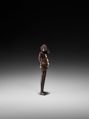 Lot 366 - A FINE EDO SCHOOL WOOD NETSUKE DEPICTING ASHINAGA WITH DRUM