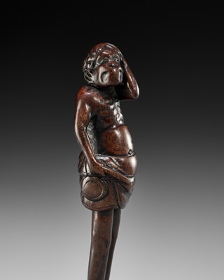 Lot 366 - A FINE EDO SCHOOL WOOD NETSUKE DEPICTING ASHINAGA WITH DRUM