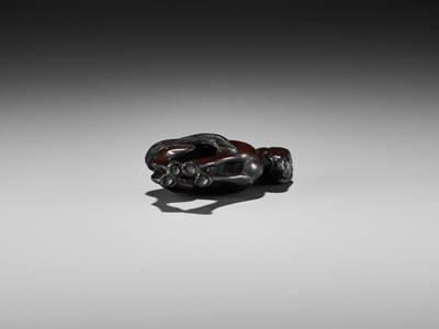 Lot 184 - TSUSEN: A FINE WOOD NETSUKE OF A HORSE