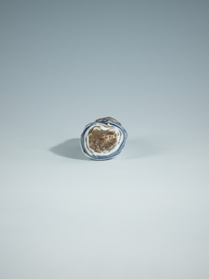 Lot 404 - A FINE HIRADO PORCELAIN NETSUKE OF FUKUROKUJU