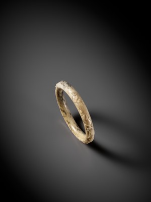 A BLACK AND WHITE JADE BANGLE, MING DYNASTY