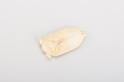 Lot 811 - A JADE TONGUE AMULET IN THE FORM OF A CICADA, HAN DYNASTY