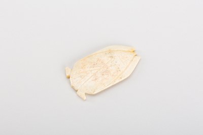 Lot 811 - A JADE TONGUE AMULET IN THE FORM OF A CICADA, HAN DYNASTY