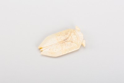 Lot 811 - A JADE TONGUE AMULET IN THE FORM OF A CICADA, HAN DYNASTY