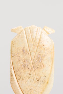 Lot 811 - A JADE TONGUE AMULET IN THE FORM OF A CICADA, HAN DYNASTY