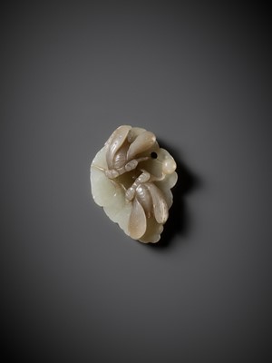 A WHITE AND PALE BROWN JADE ‘CICADAS ON LEAF’ PENDANT, QING DYNASTY