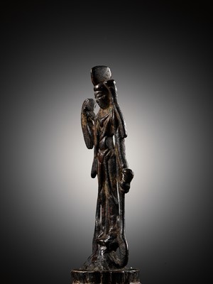 Lot 310 - A BRONZE FIGURE OF GUANYIN, TANG DYNASTY