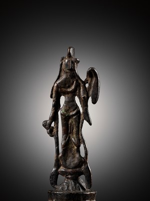 Lot 310 - A BRONZE FIGURE OF GUANYIN, TANG DYNASTY
