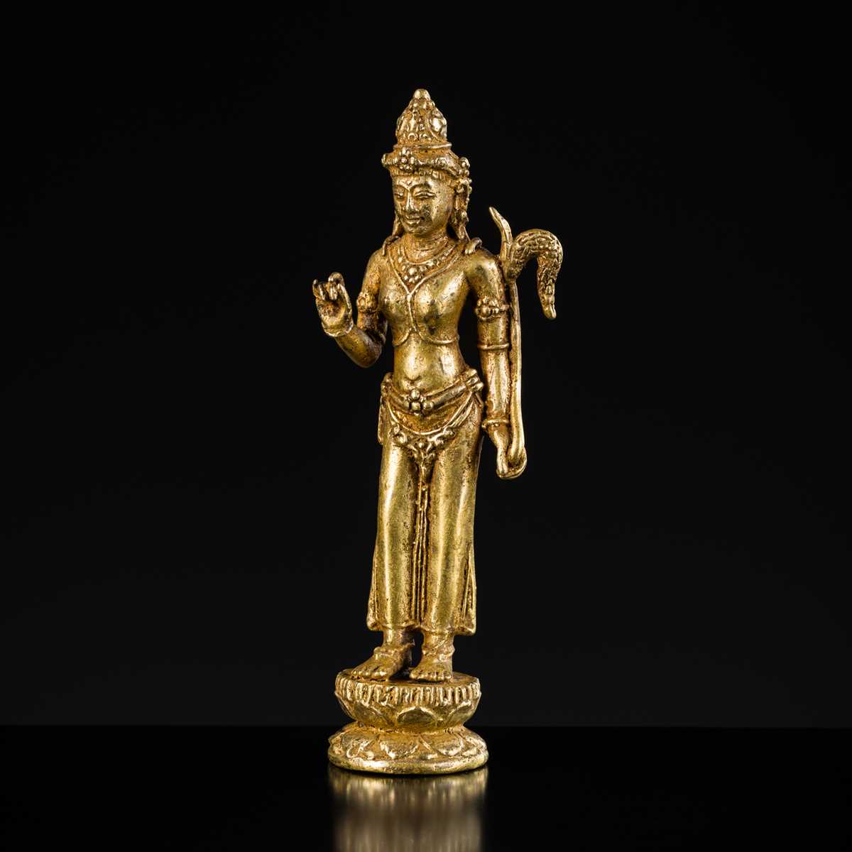 Lot 606 - A SMALL GILT BRONZE FIGURE OF DEWI SRI, JAVA