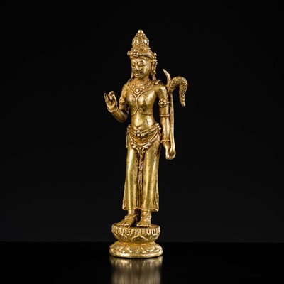 Lot 606 - A SMALL GILT BRONZE FIGURE OF DEWI SRI, JAVA