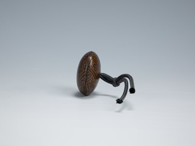 Lot 367 - A FINE AKAGANE AND SHAKUDO MANJU NETSUKE