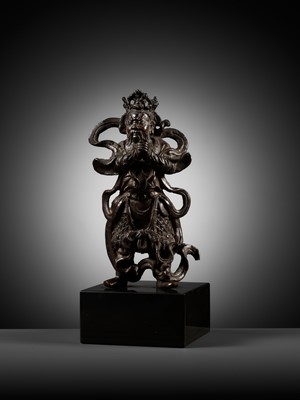A BRONZE WARRIOR FIGURE OF A GUARDIAN KING, MING DYNASTY