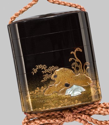Lot 290 - A FINE BLACK LACQUER FOUR-CASE INRO DEPICTING TOBA ON HIS MULE