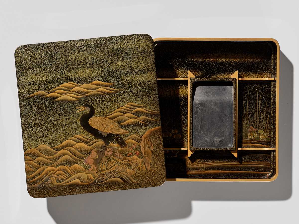 Lot 34 - A SUPERB LACQUER SUZURIBAKO DEPICTING A CORMORANT