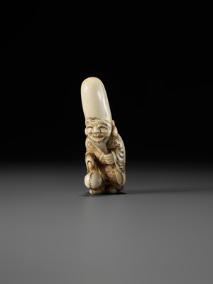 Lot 69 - AN OSAKA SCHOOL IVORY NETSUKE OF FUKUROKUJU PLAYING KEMARI