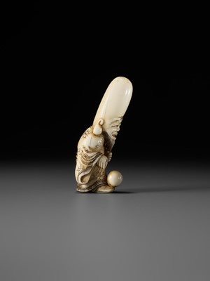 Lot 69 - AN OSAKA SCHOOL IVORY NETSUKE OF FUKUROKUJU PLAYING KEMARI