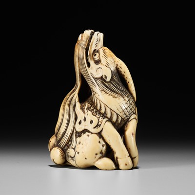 Lot 431 - AN IVORY NETSUKE OF A BAYING KIRIN, ATTRIBUTED TO MITSUHARU