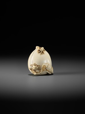 Lot 40 - AN IVORY NETSUKE OF A PEACH WITH INSECTS