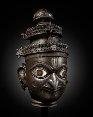 Lot 262 - A RARE SILVER AND COPPER INLAID BRONZE HEAD OF GARUDA, SOUTH INDIA, 18TH CENTURY