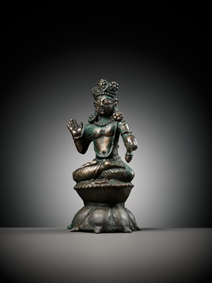 Lot 236 - A SILVERED COPPER-ALLOY FIGURE OF BUDDHA MAITREYA WITH SILVER-INLAID EYES, SWAT VALLEY, 7TH-8TH CENTURY