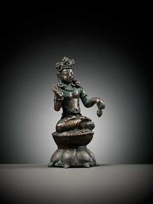 Lot 236 - A SILVERED COPPER-ALLOY FIGURE OF BUDDHA MAITREYA WITH SILVER-INLAID EYES, SWAT VALLEY, 7TH-8TH CENTURY