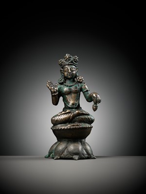 Lot 236 - A SILVERED COPPER-ALLOY FIGURE OF BUDDHA MAITREYA WITH SILVER-INLAID EYES, SWAT VALLEY, 7TH-8TH CENTURY