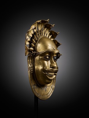 Lot 303 - A BRONZE MASK OF JUMADI, BHUTA CULTURE, 18TH-19TH CENTURY
