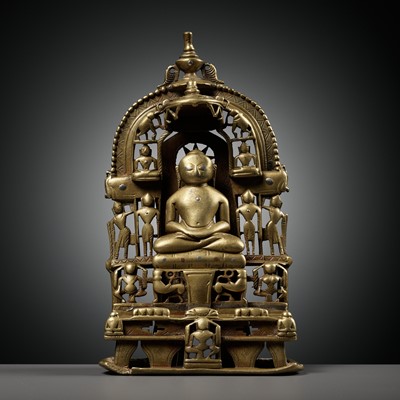 Lot 634 - A JAIN COPPER AND SILVER-INLAID BRASS SHRINE, DATED 1463