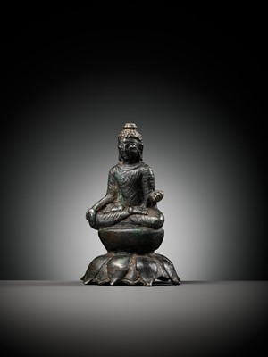 Lot 237 - A SILVERED COPPER-ALLOY FIGURE OF BUDDHA SHAKYAMUNI WITH SILVER-INLAID EYES, SWAT VALLEY, 7TH-8TH CENTURY