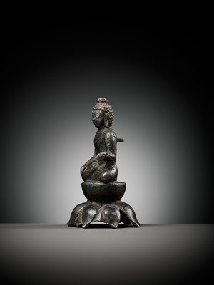 Lot 237 - A SILVERED COPPER-ALLOY FIGURE OF BUDDHA SHAKYAMUNI WITH SILVER-INLAID EYES, SWAT VALLEY, 7TH-8TH CENTURY