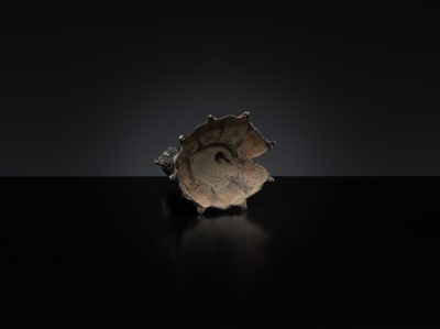 Lot 237 - A SILVERED COPPER-ALLOY FIGURE OF BUDDHA SHAKYAMUNI WITH SILVER-INLAID EYES, SWAT VALLEY, 7TH-8TH CENTURY