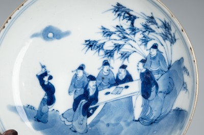 A BLUE AND WHITE ‘SEVEN SCHOLARS’ PORCELAIN DISH, KANGXI MARK AND PERIOD