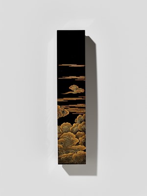 A MAGNIFICENT LACQUER WRITING SET WITH THE RISING SUN, CRESCENT MOON AND CLOUDS
