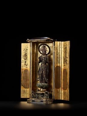 Lot 326 - A LARGE LACQUERED WOOD ZUSHI (PORTABLE SHRINE) CONTAINING A GILT WOOD FIGURE OF KANNON BOSATSU