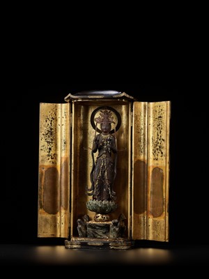 Lot 326 - A LARGE LACQUERED WOOD ZUSHI (PORTABLE SHRINE) CONTAINING A GILT WOOD FIGURE OF KANNON BOSATSU