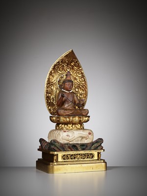 A PARTLY GILT AND LACQUERED WOOD FIGURE OF FUGEN BOSATSU