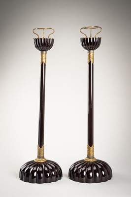 Lot 32 - A PAIR OF BLACK LACQUERED CANDLESTICKS