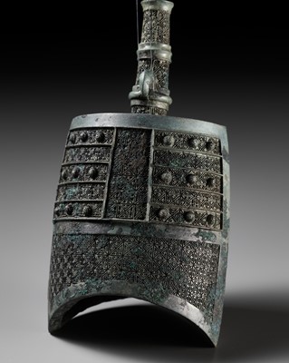 Lot 63 - A MINIATURE ARCHAIC BRONZE BELL, YONG, WARRING STATES PERIOD