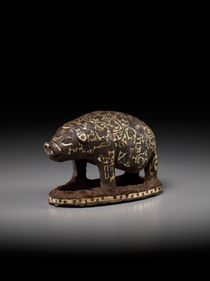 Lot 66 - A GOLD AND SILVER-INLAID IRON FIGURE OF A PIG, WARRING STATES PERIOD TO HAN DYNASTY