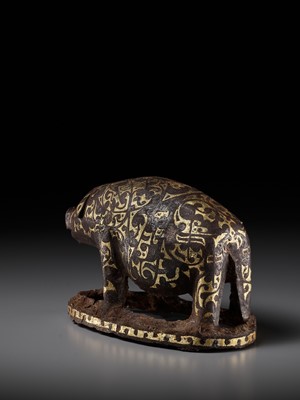 Lot 66 - A GOLD AND SILVER-INLAID IRON FIGURE OF A PIG, WARRING STATES PERIOD TO HAN DYNASTY